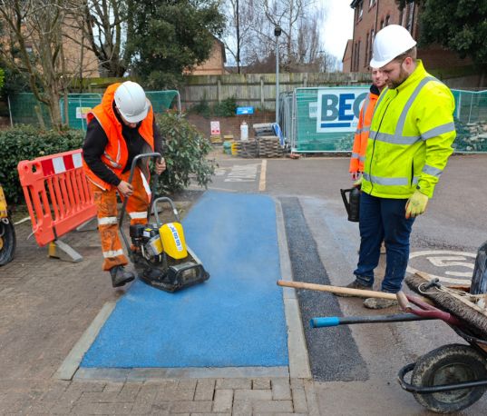 Bega Groundworks Construction workers installing a safety walkway.