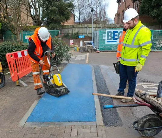 Bega Groundworks Construction workers installing a safety walkway.